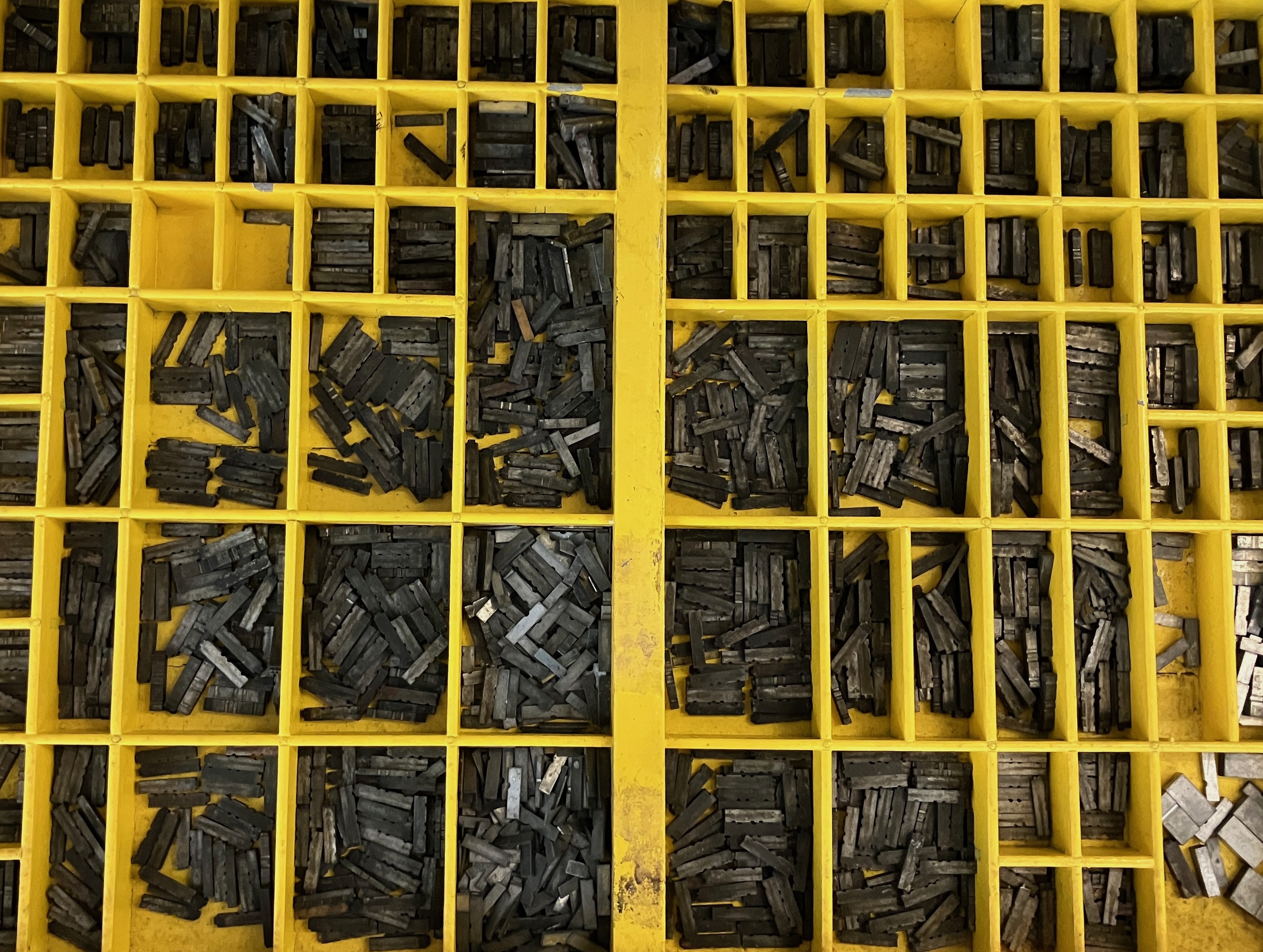 Type case with yellow-topped letters from Virginia Book Arts